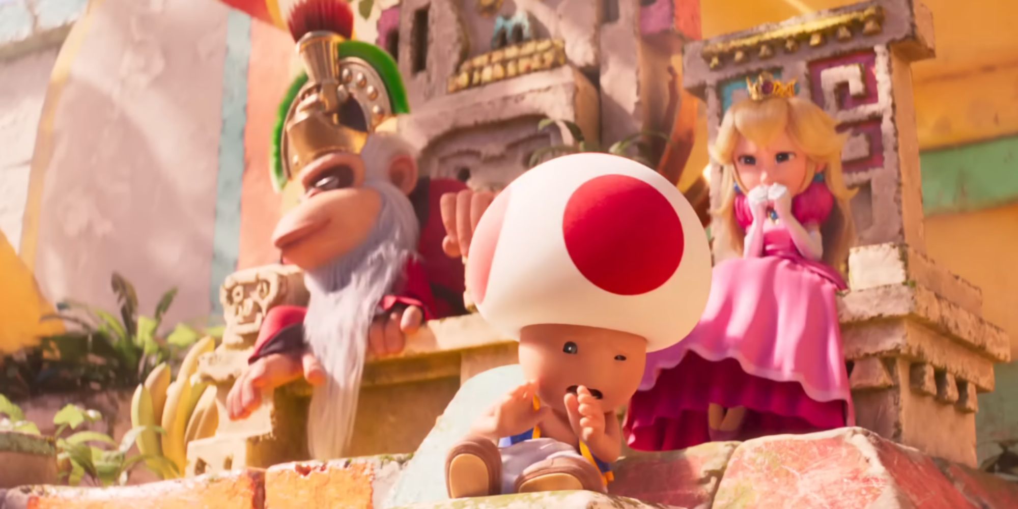 Toad and Princess Peach flinch while Cranky Kong looks away in The Super Mario Bros. Movie