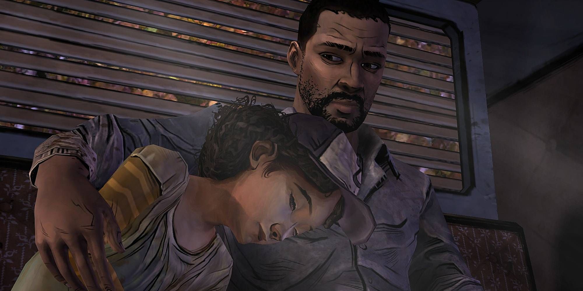 An adult man sits in a vehicle and comforts a small girl who lays next to him in Telltale's The Walking Dead