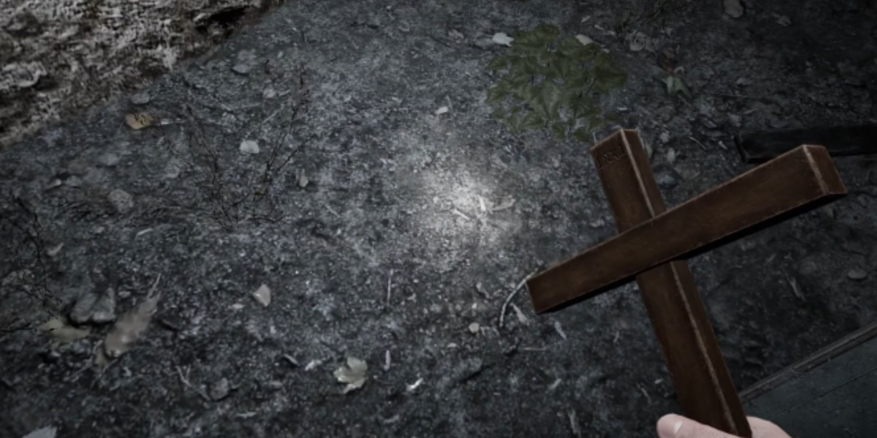 Demonologist's cross pointing to the ground