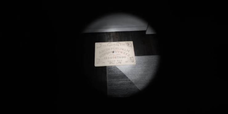 The Demonologist Ouija Board Lying On The Ground