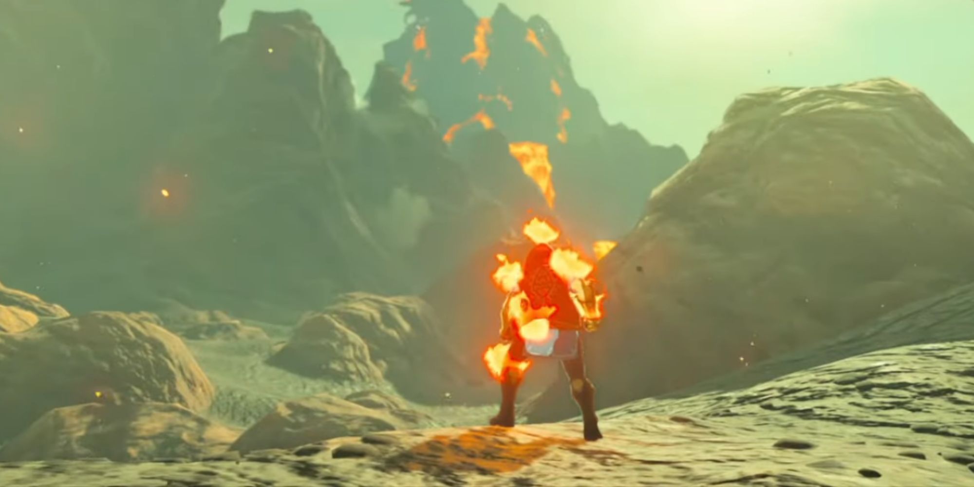 Link is on fire at the base of the Eldin Volcano