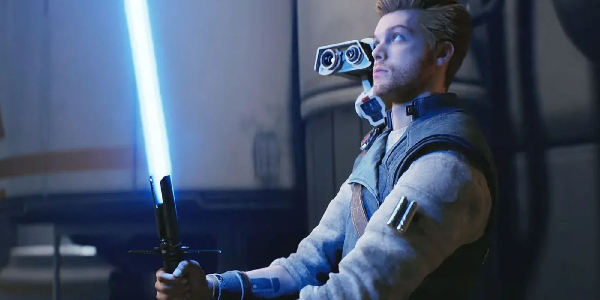 Star Was Jedi Survivor with Cal holding a lightsaberand BD-1 on his shoulder looking at the blue glow.