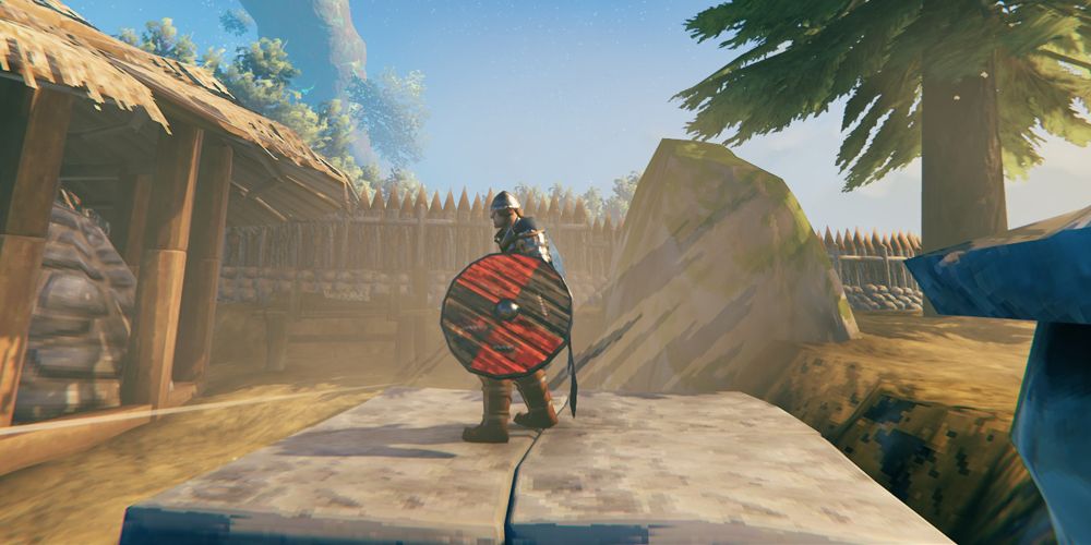 Valheim 12 Best Shields   Viking Holding Banded Shield In Valheim 