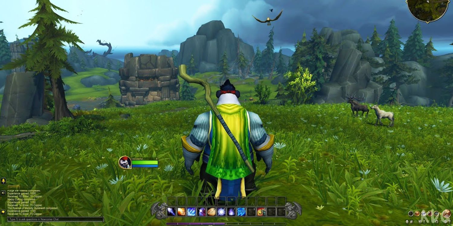 The player's character standing in a field of grass among animals in World Of Warcraft.
