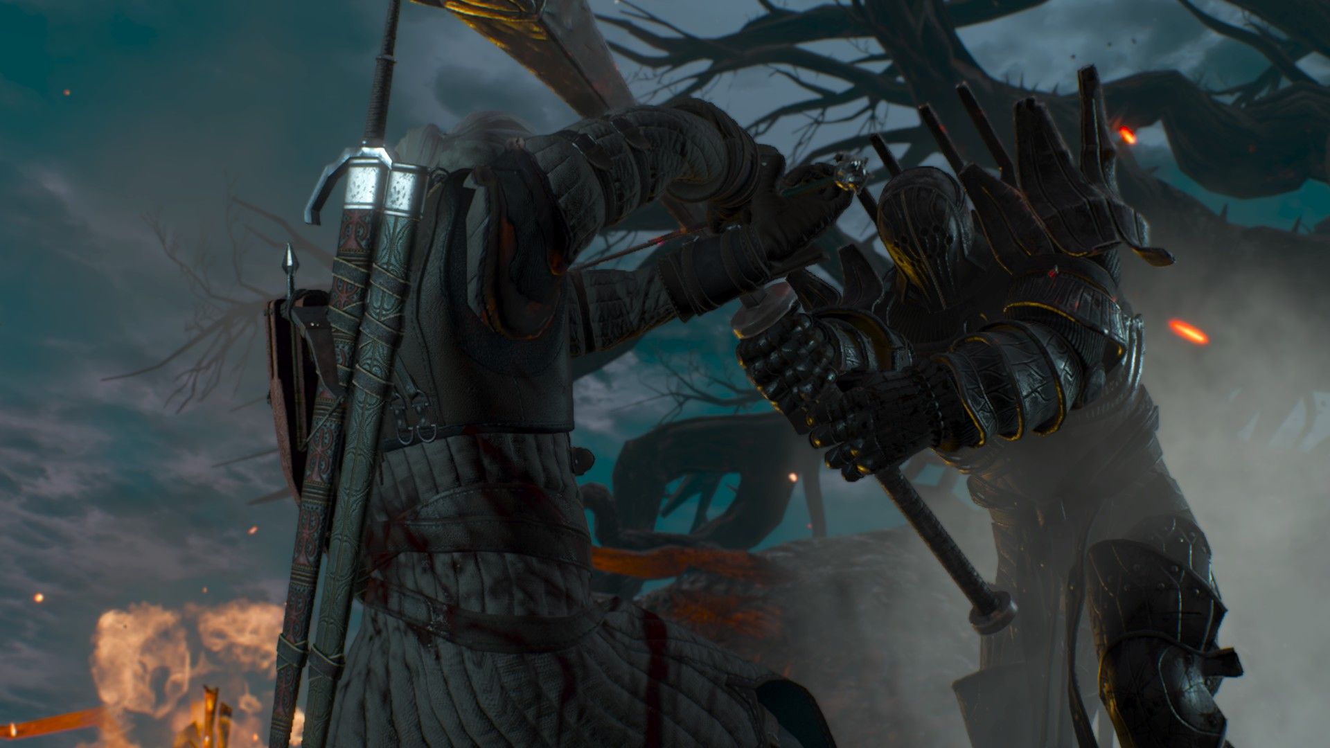 Geralt parries a large mace as he fights an armored elf on top of a mountain.