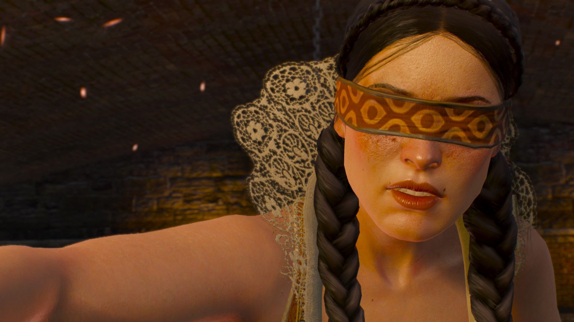 A screenshot of a blindfolded woman casting magic in the sewers of Novigrad.