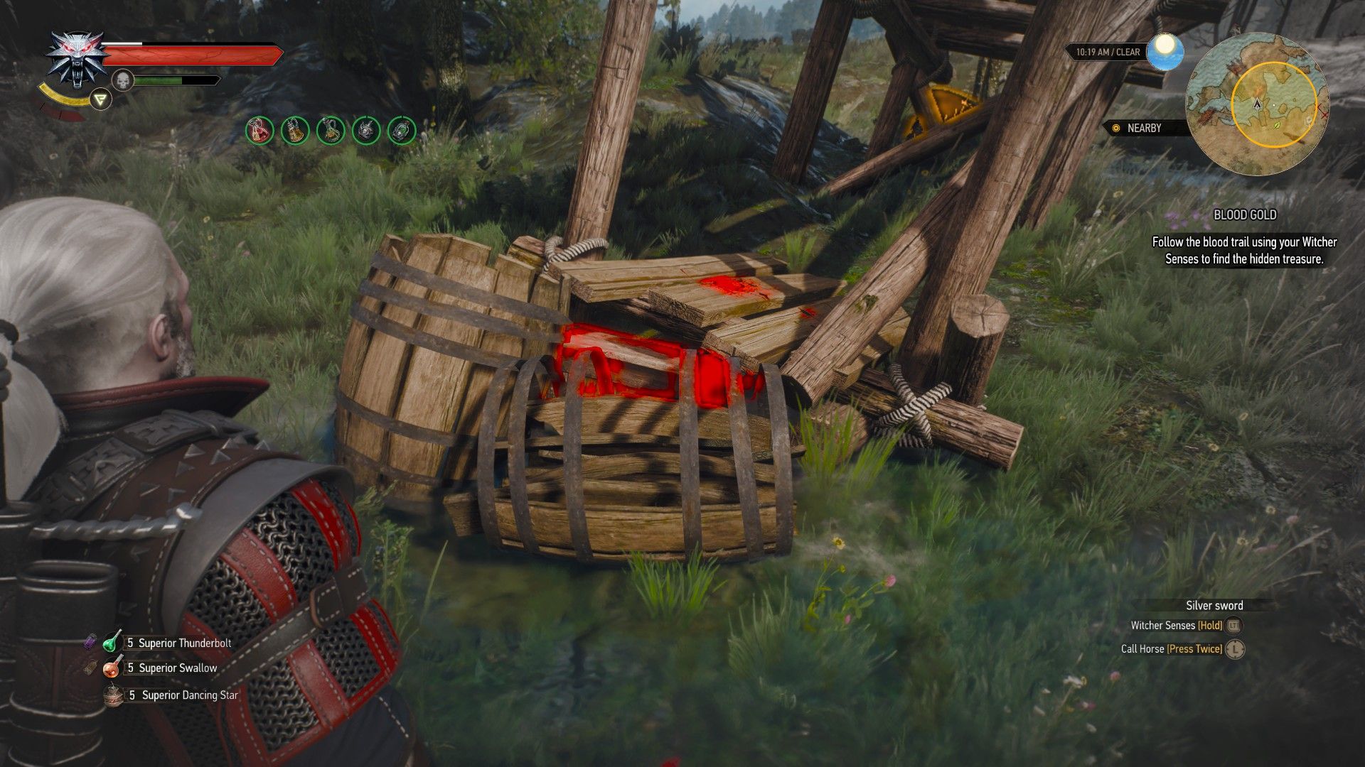 A screenshot of the Witcher 3, with Geralt&rsquo;s Witcher Senses highlighting a hidden chest in red.