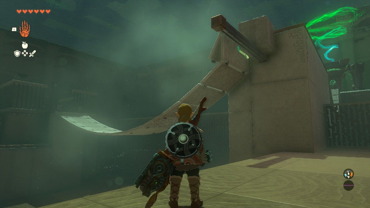 Link looks at a bridge connected to a stone block in the third puzzle solution in Legend of Zelda: Tears of the Kingdom