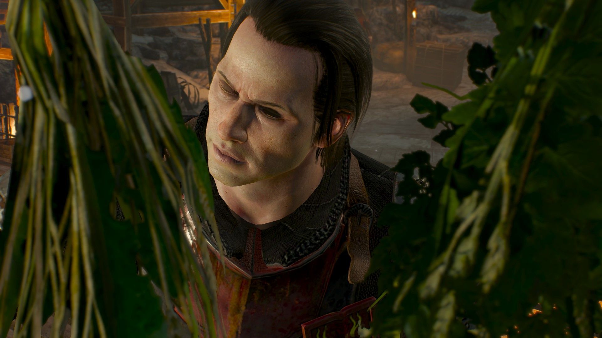 A man wearing red armor inspects some plants used in the production of narcotics.