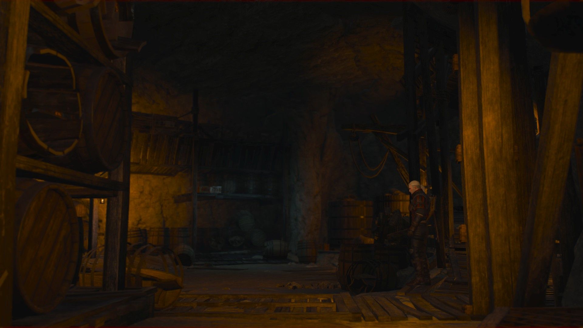 Geralt enters the wine cellar with the monster off-screen.