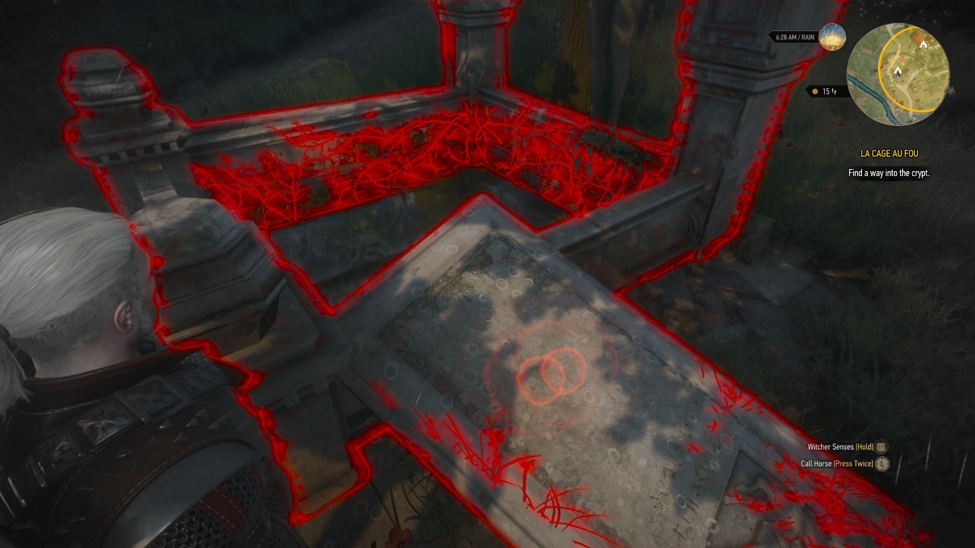 A screenshot of Geralt's Witcher Senses highlighting the open structure in Toussaint Cemetery.