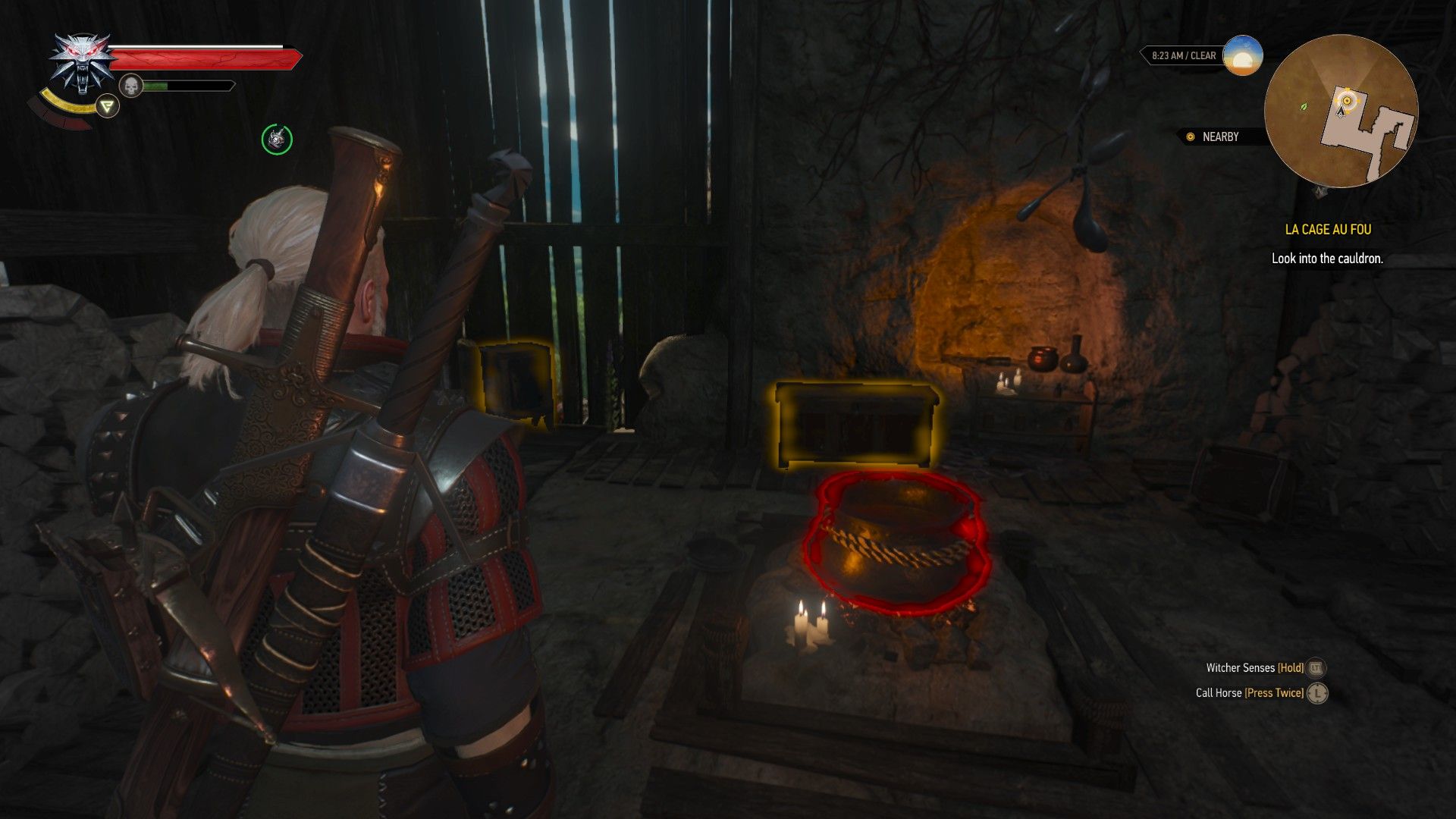 Screenshot of Geralt's Witcher Senses, with the cauldron required for the quest highlighted in red.