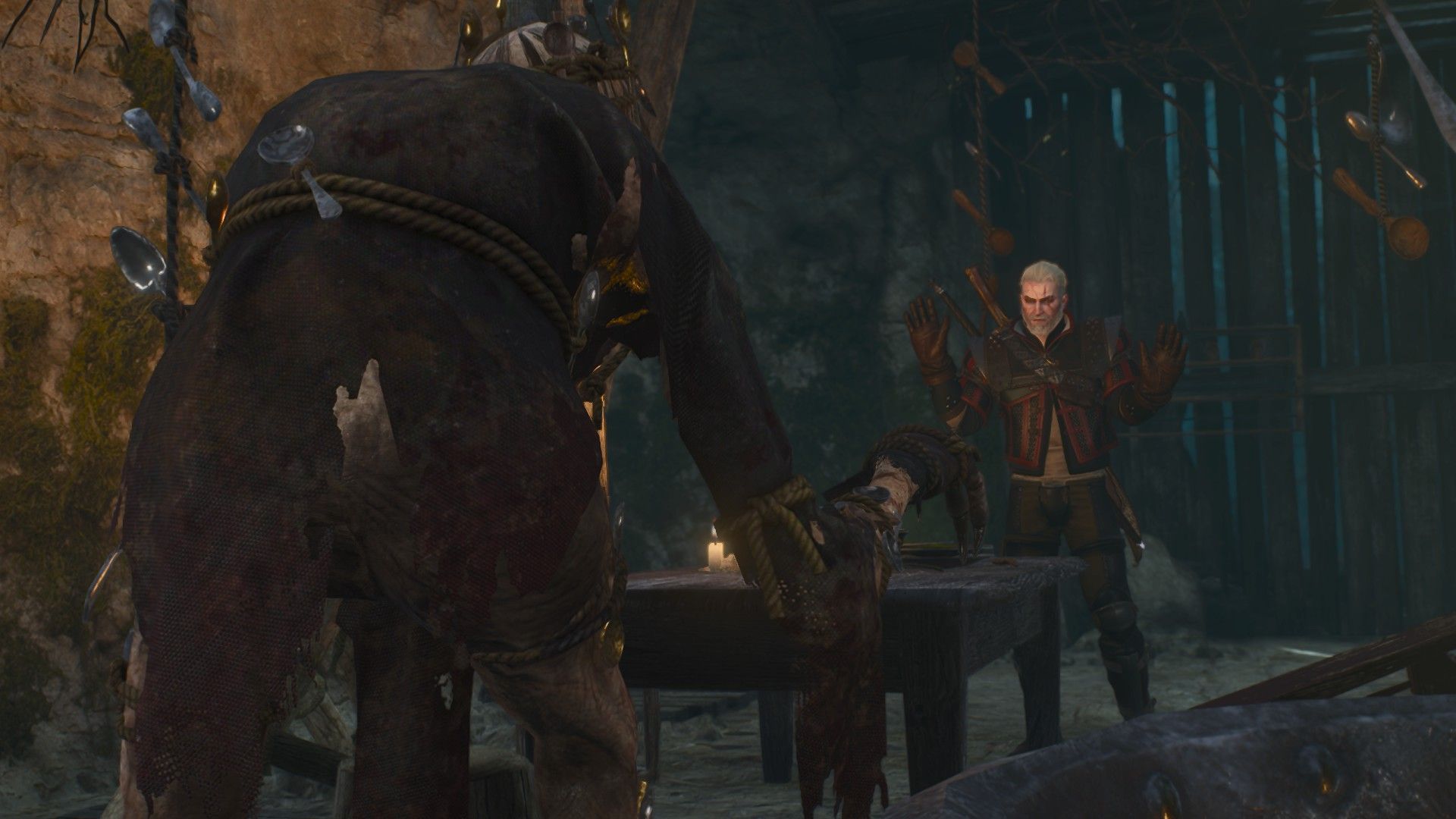Geralt walks towards the monster with his hands up and tries to talk to it.