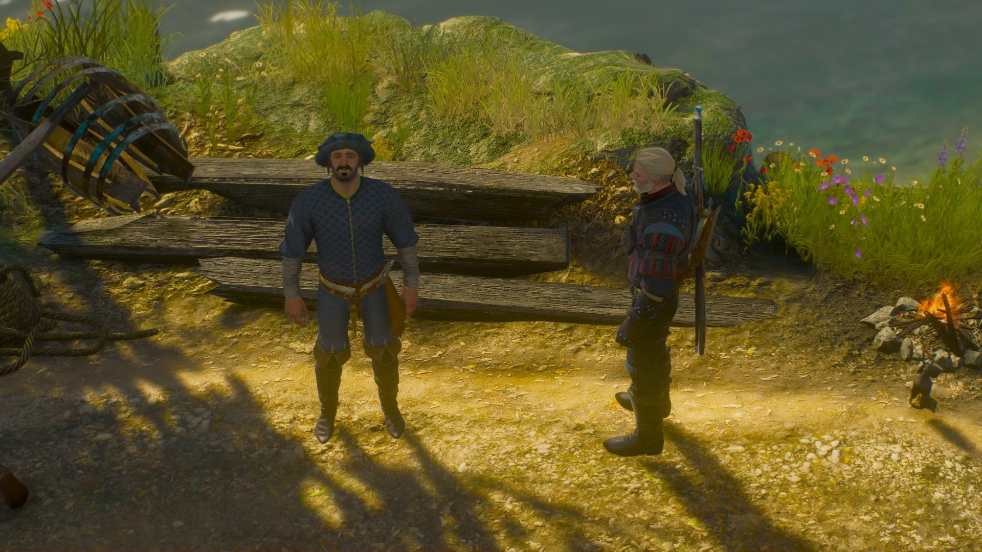 A screenshot of Geralt walking to the site supervisor in the evening.