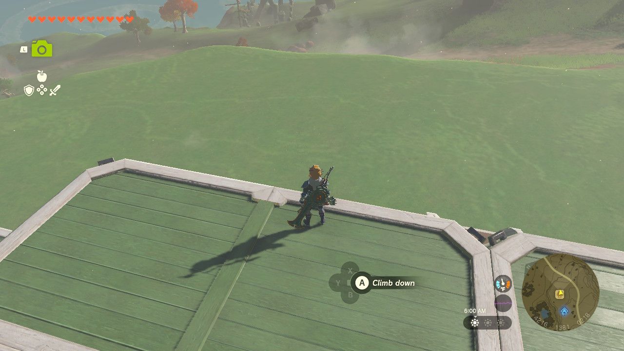 Link stands on the roof of his house