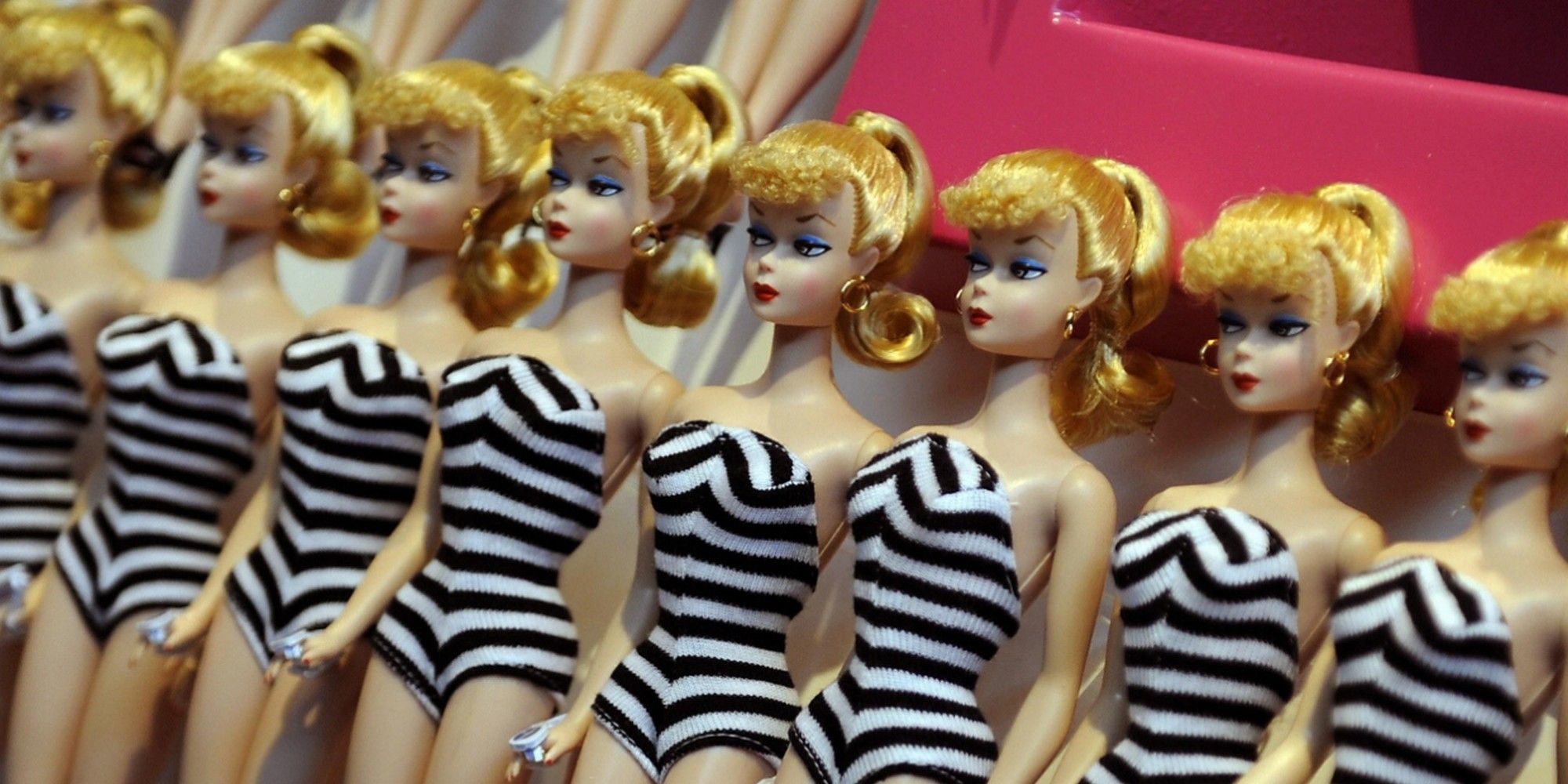 a lineup of original barbies rarest barbie dolls