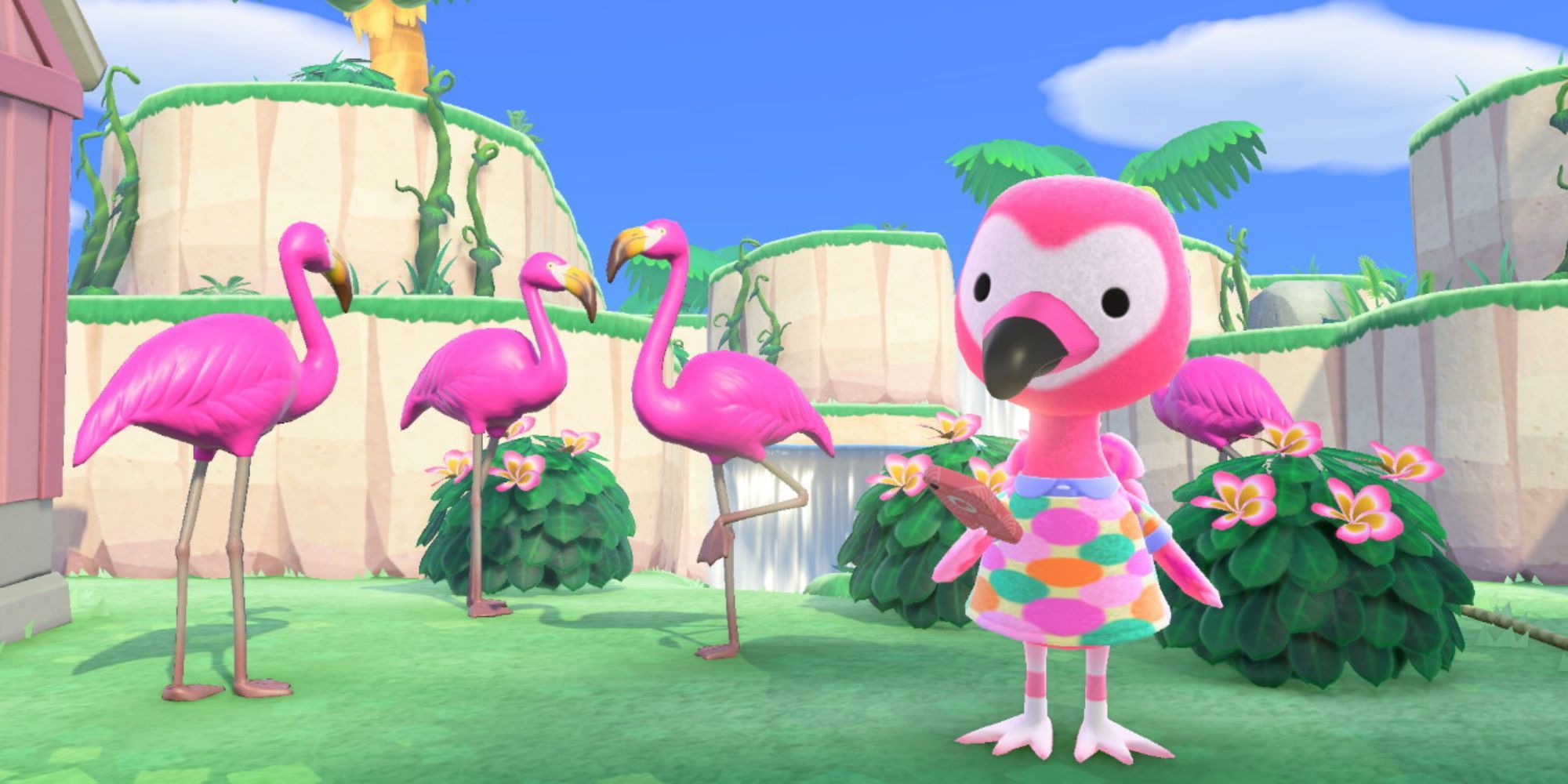 Flora looks at her phone outside while surrounded by plastic flamingos