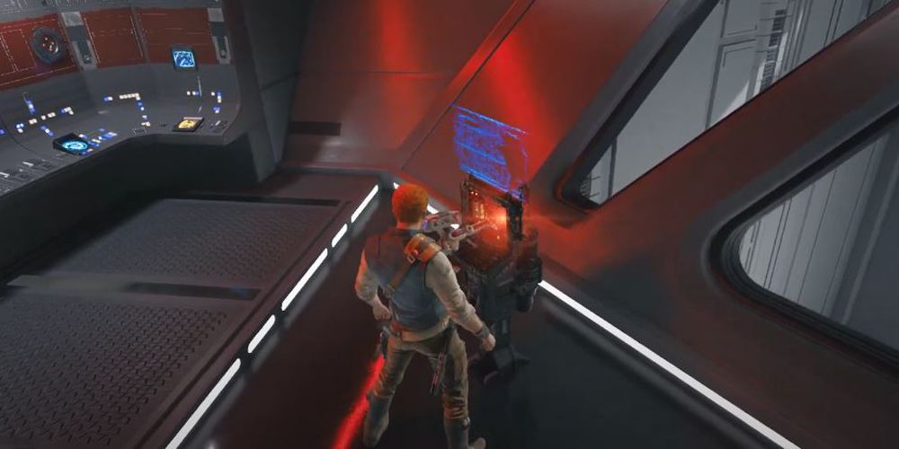 Cal standing by databanks map upgrade terminal in Star Wars Jedi: Survivor.
