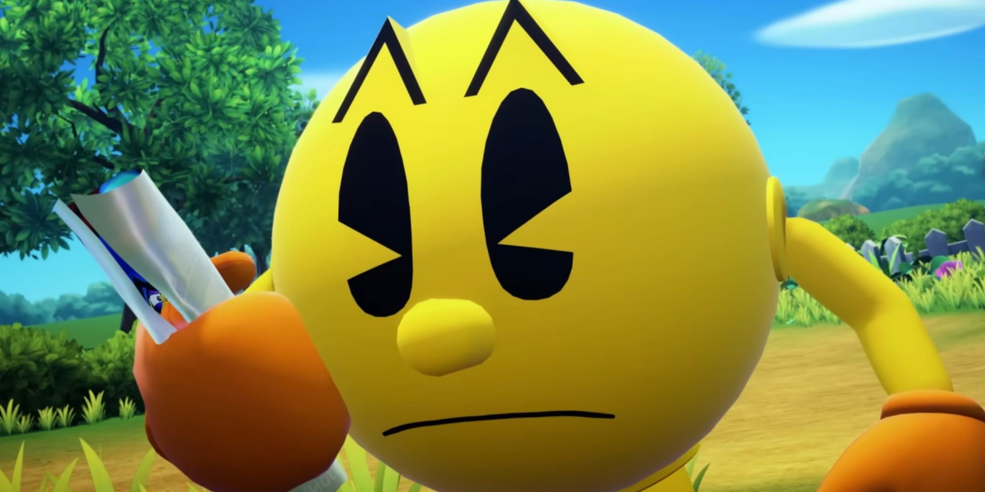pac-man holding paper and looking frustrated