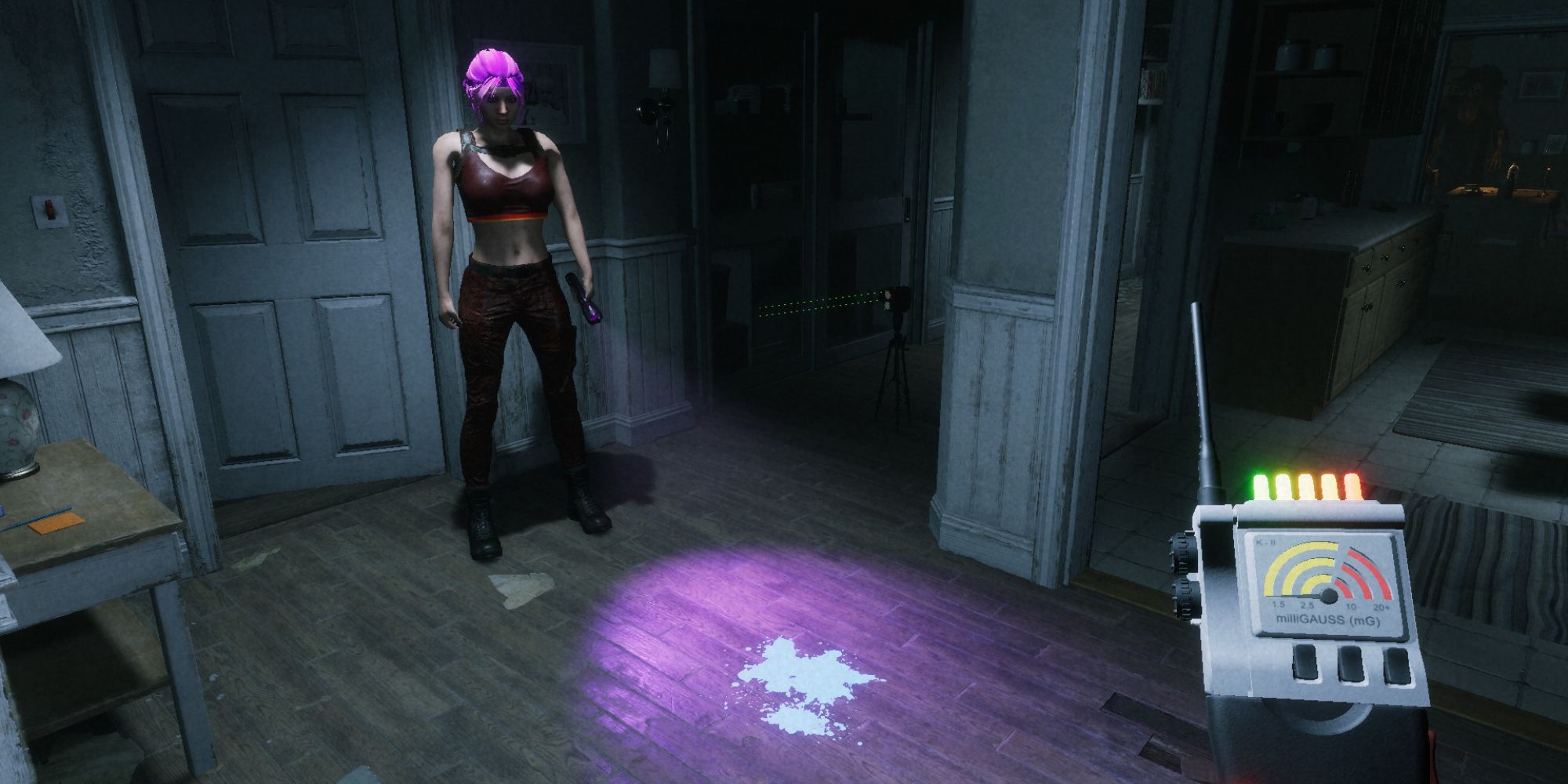 ghost watchers player pointing uv light on ground and other player holding emf reader