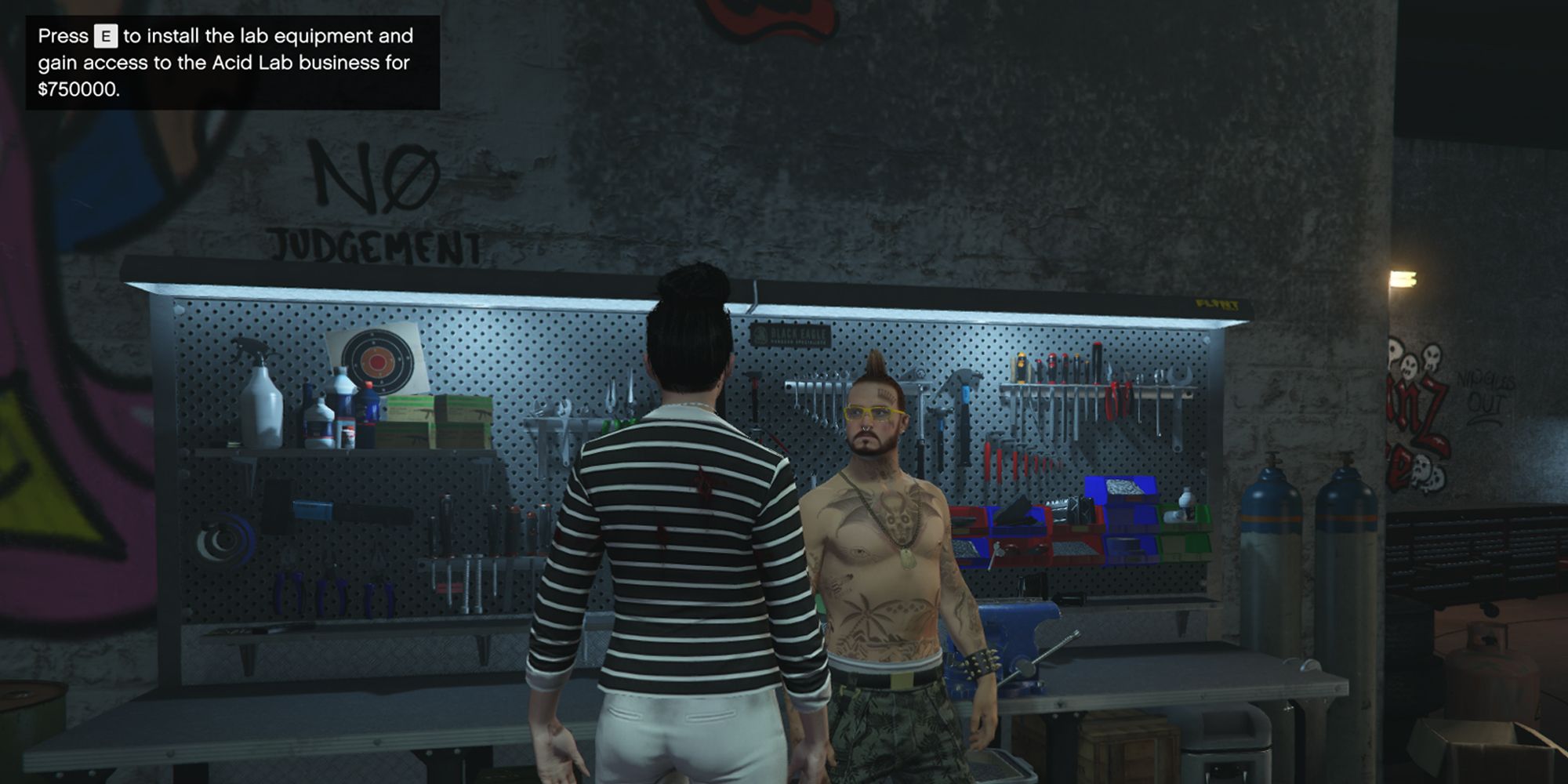 The image shows a Grand Theft Auto Online player standing next to Mutt in the Freakshop in the workbench area.  The text at the top left reads 