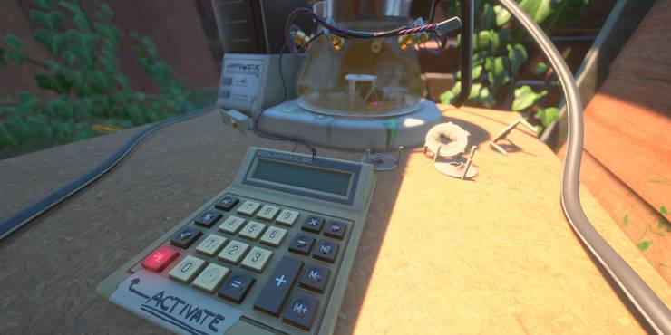 A broken and modified coffee pot sits adjacent to a calculator switch in Grounded.