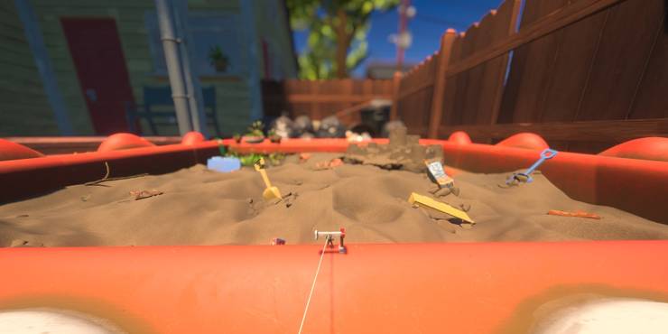 One of the Grounded characters stands under the zipline leading to the Sandbox in Grounded.