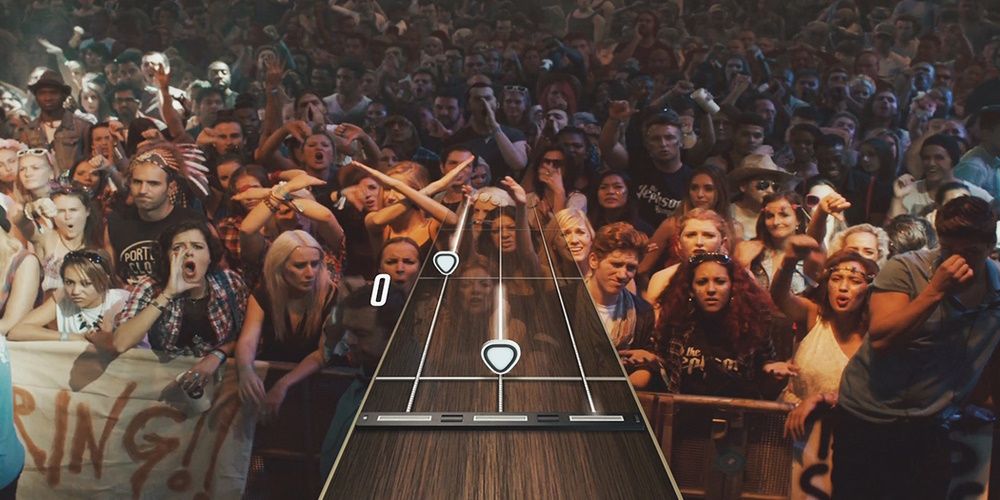Guitar Hero Live gameplay screenshot of a live video and crowd 
