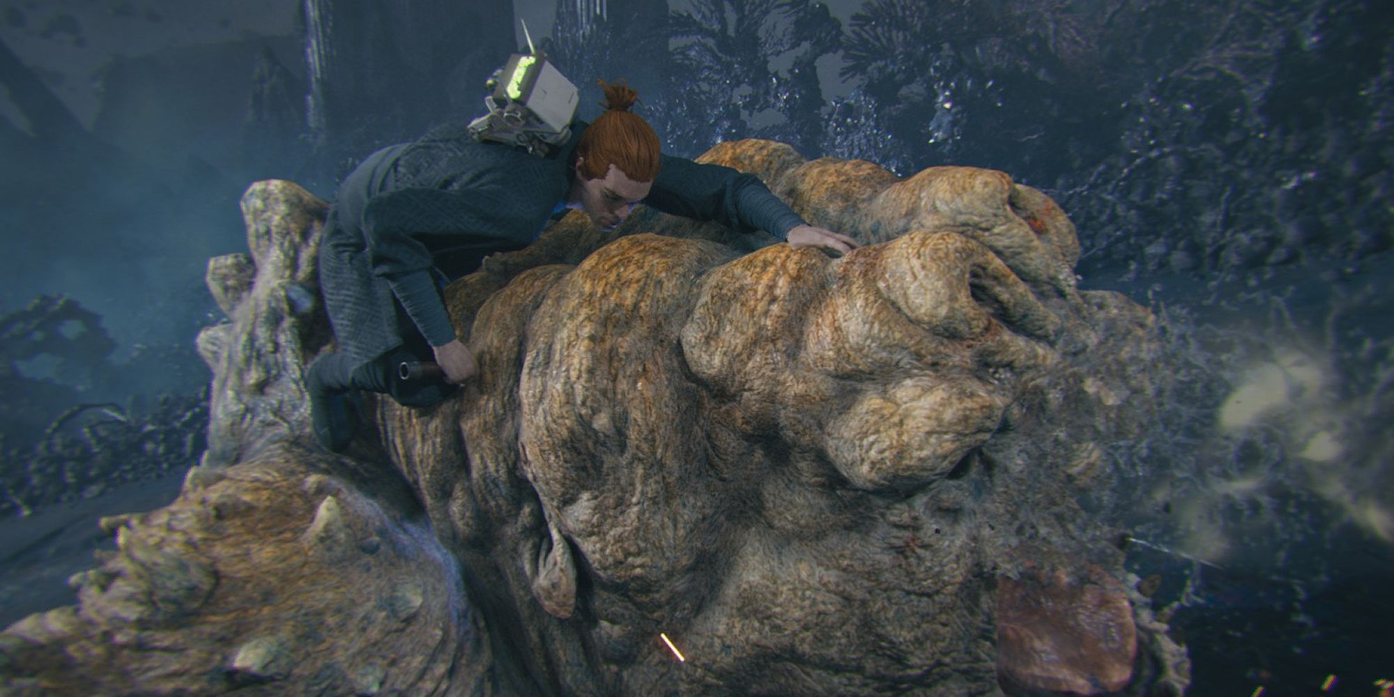 An image of Cal Kestis from Star Wars Jedi: Survivor driving his lightsaber into the hide of a Rancor, a ferocious beast found in the force tear Fractured Malice. 