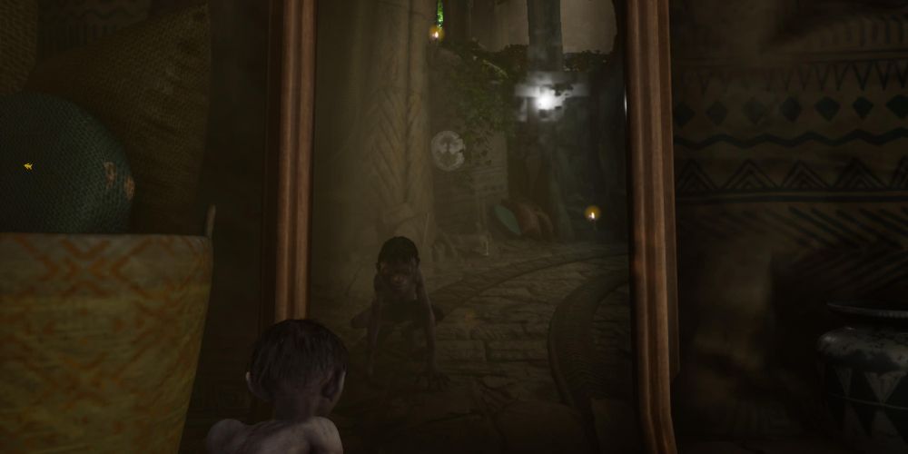 smeagol looks into the Riddlemaster's mirror in The Lord of the Rings: Gollum