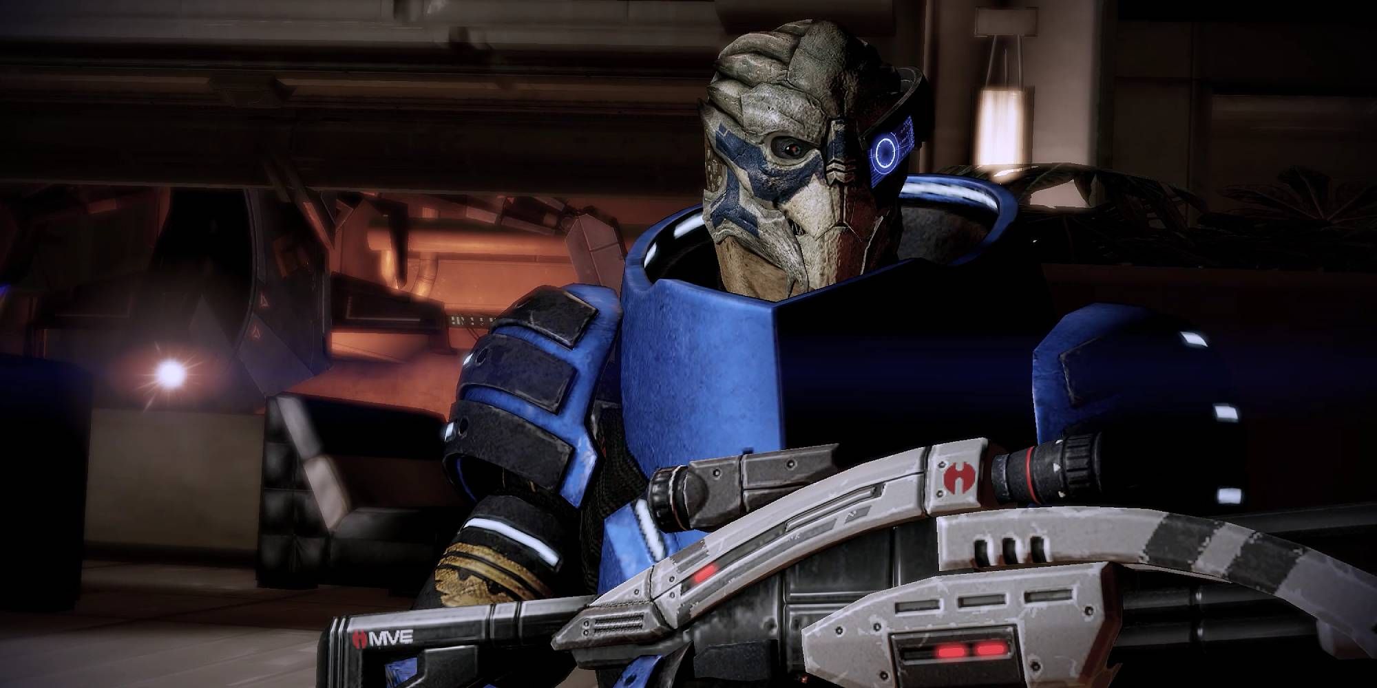 A reptilian alien holds a gun as he looks elsewhere in Mass Effect 1