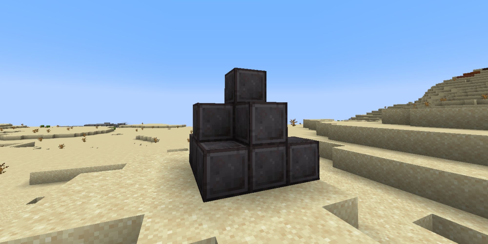 Minecraft Blocks of Netherite in the desert