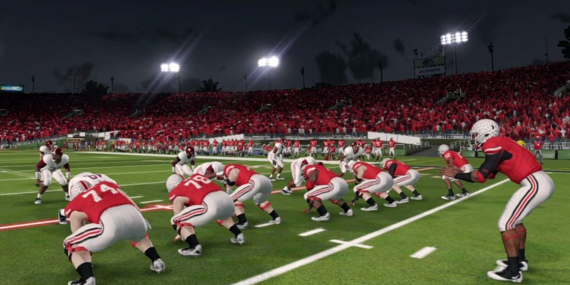 In NCAA Football 14, the Ohio State quarterback gets ready to snap the ball.