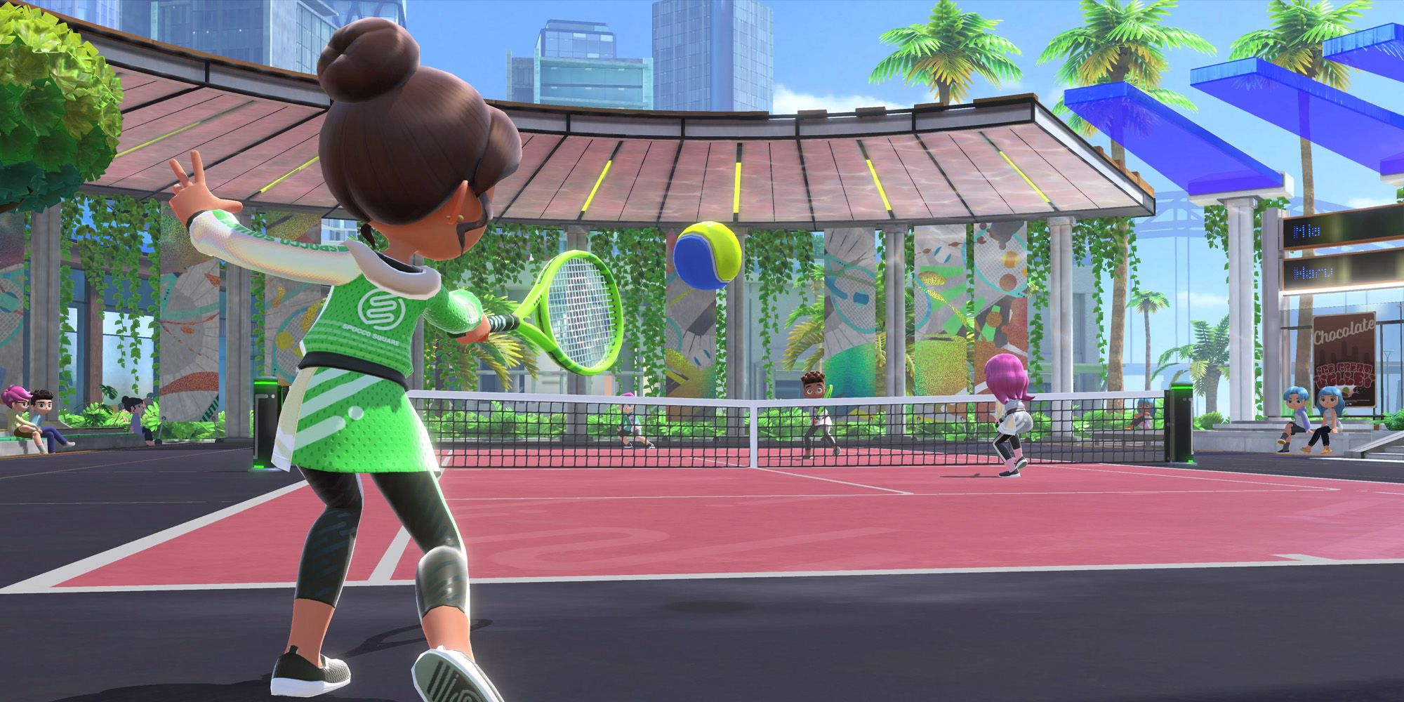 A character about to hit the ball in a double match.