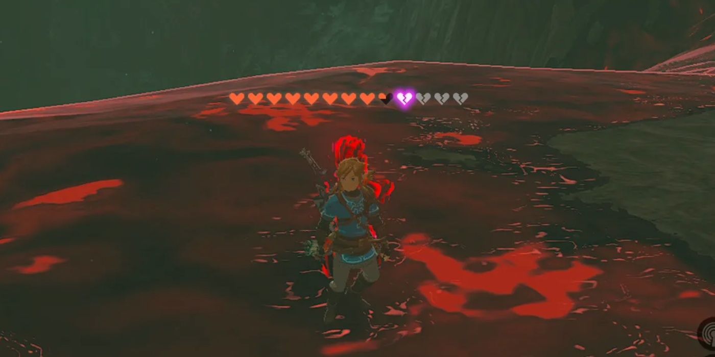 Link has his Hearts drained by the Gloom in The Legend Of Zelda: Tears Of The Kingdom.