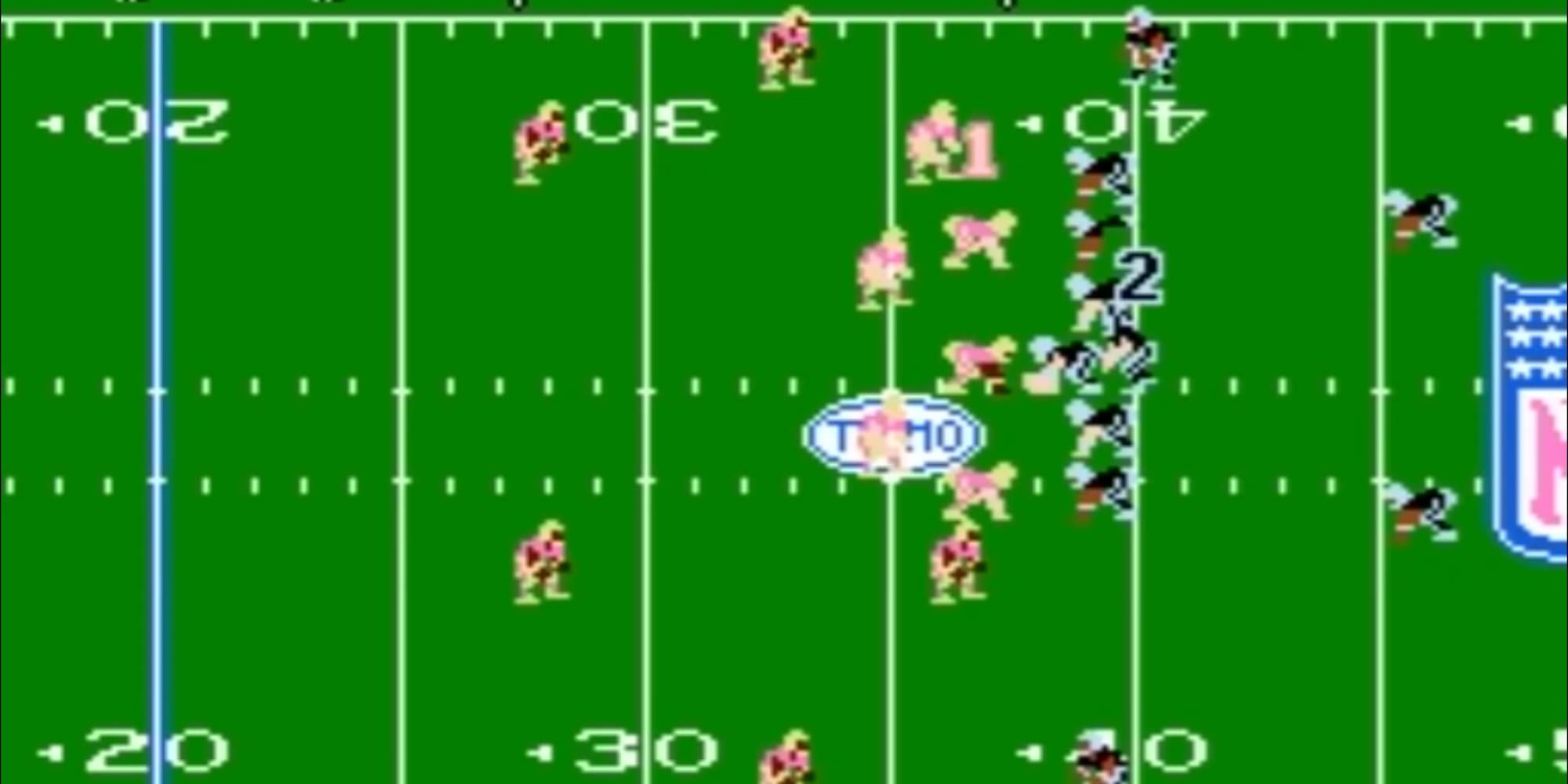 Two teams face off at the line of scrimmage in the Tecmo Super Bowl.