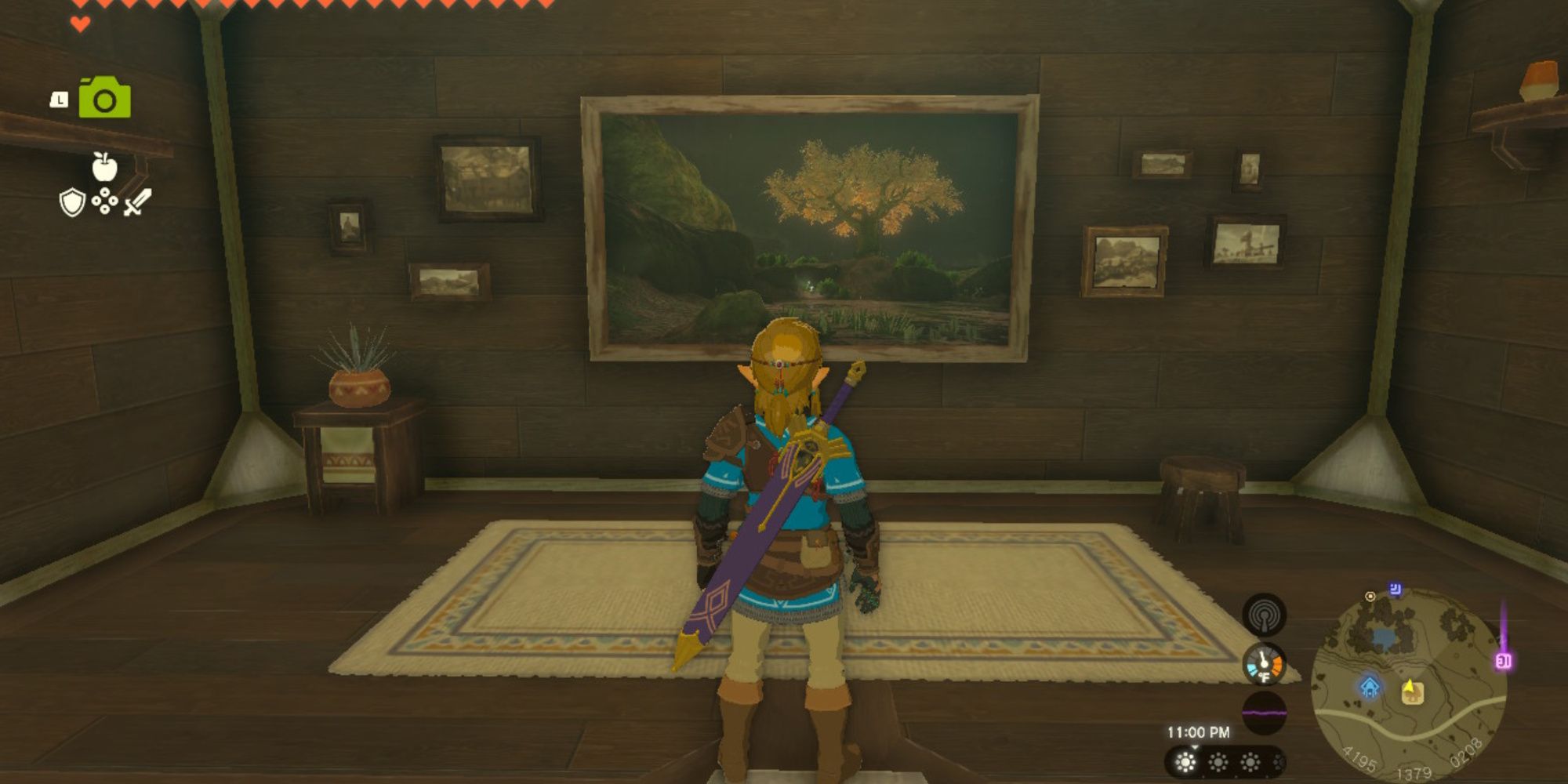 the legend of zelda tears of the kingdom gallery room in link's house with a photo of satori mountain's cherry tree on a rainy day on display