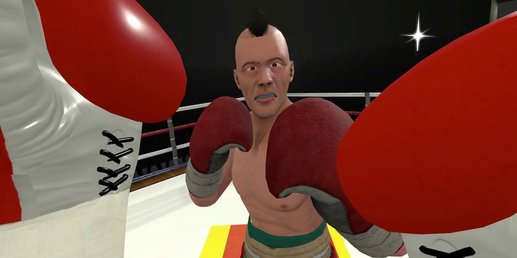 The player raises the gloves to block the opponent's blows in The Thrill Of The Fight.