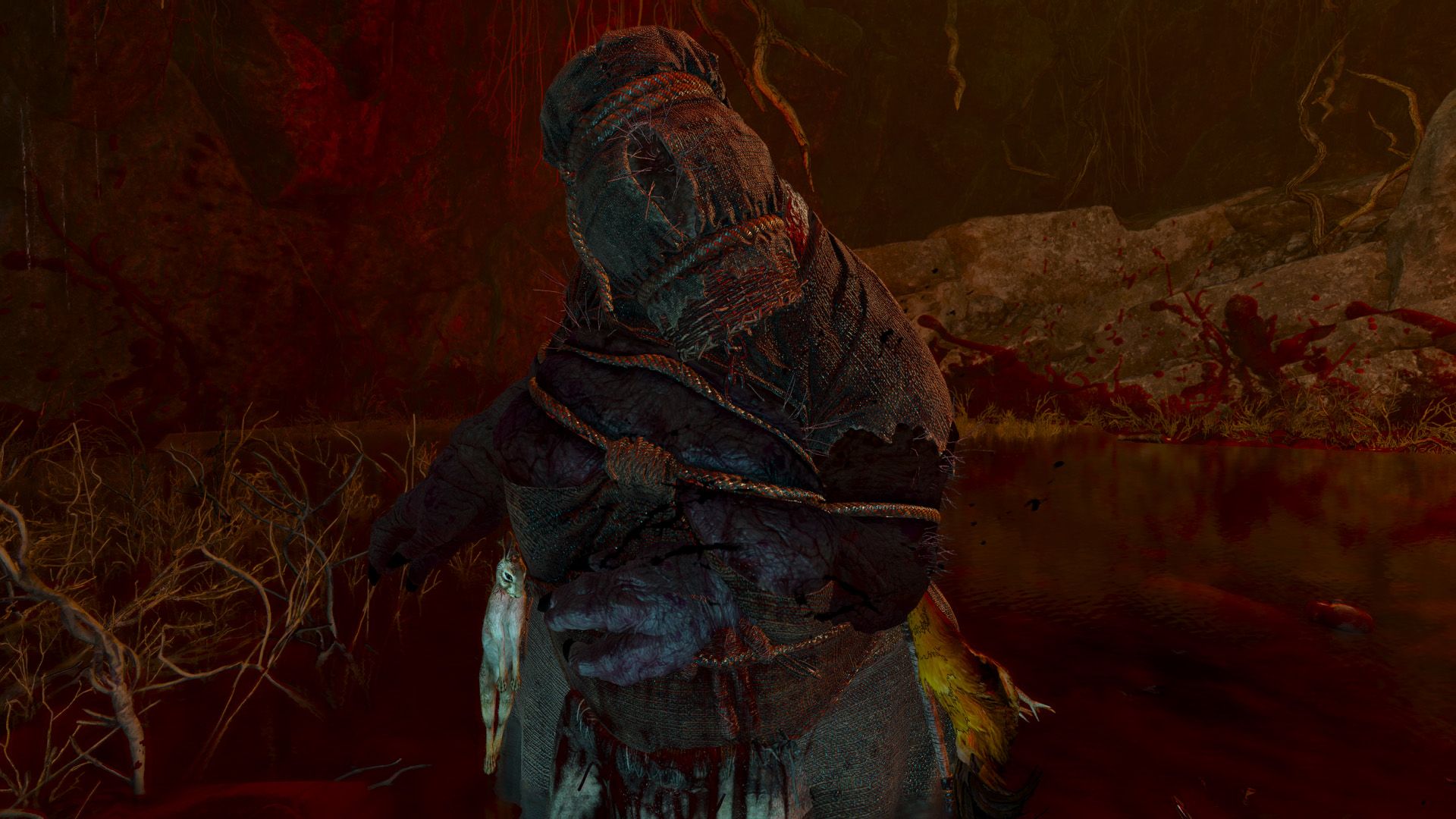 A screenshot of a deformed woman with a basket on her head stands in a pool of blood.