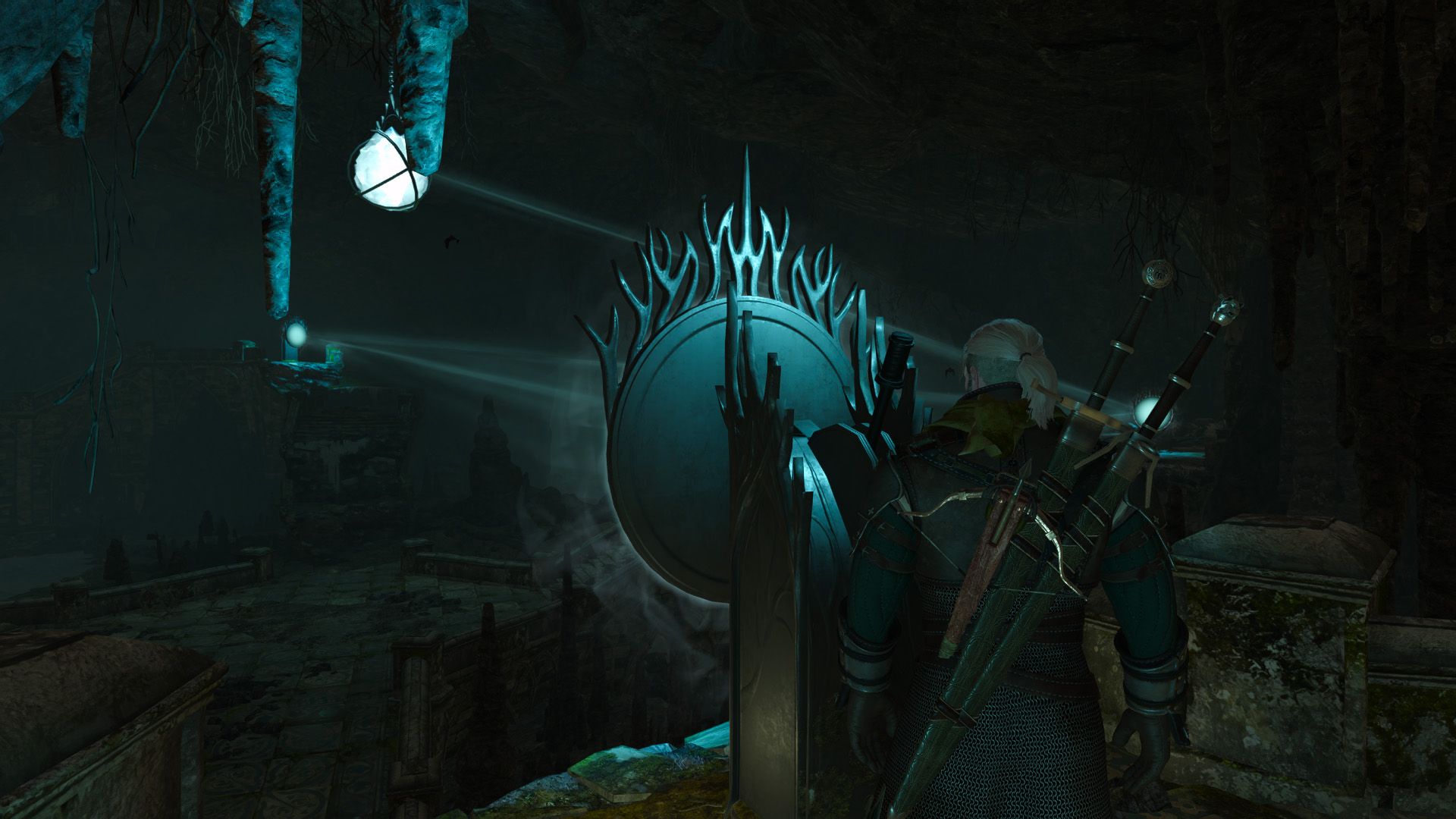 Geralt stands in an underground cavern with a mirror puzzle illuminating the space.