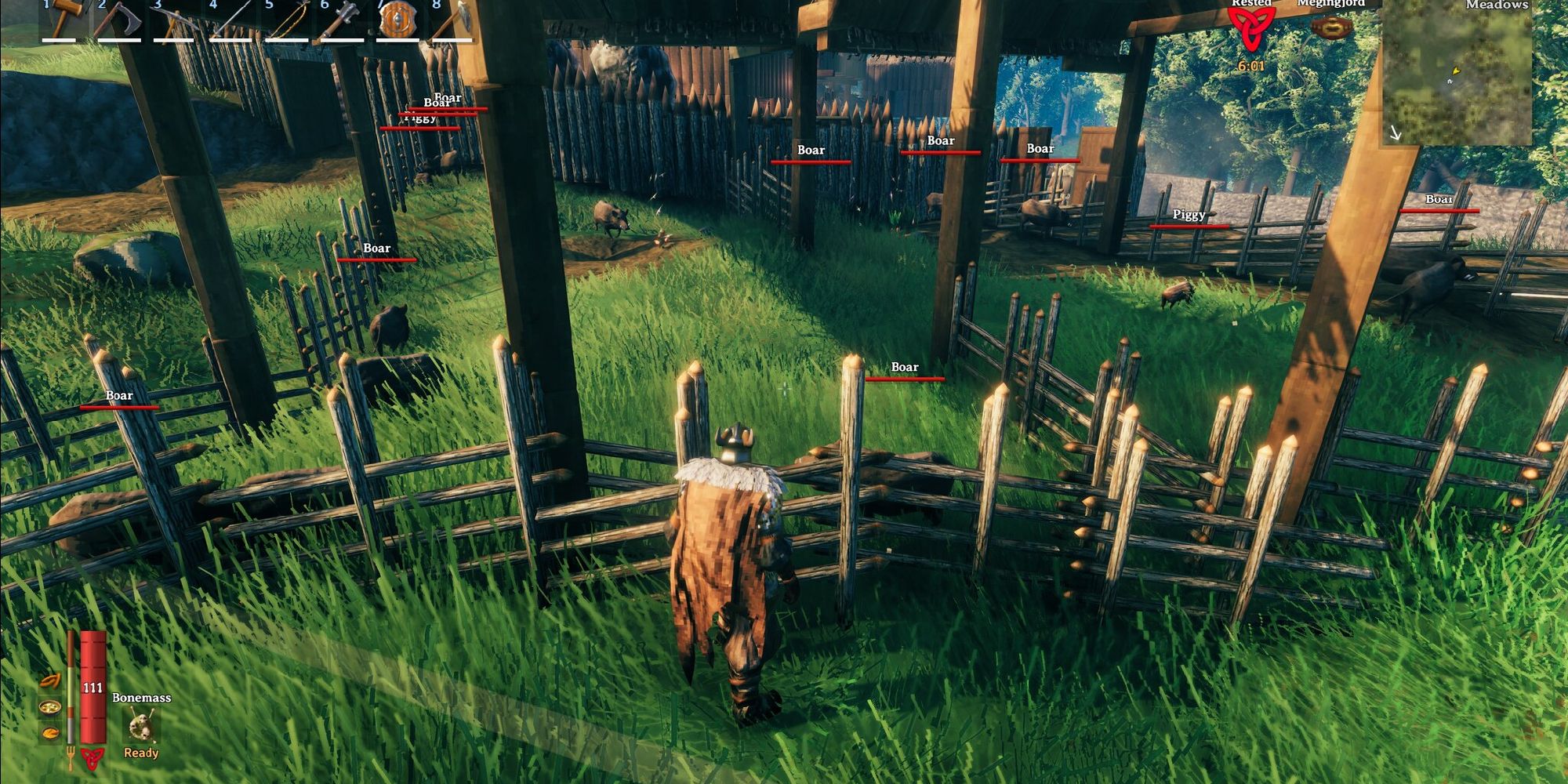 valheim covered boar pen with several boar spread out in grass