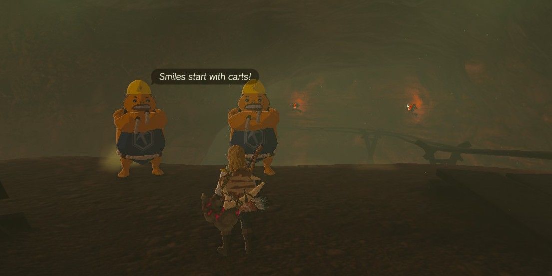 Screenshot of Zelda Tears of the Kingdom standing in front of two of the three Goron brothers in the screenshot link