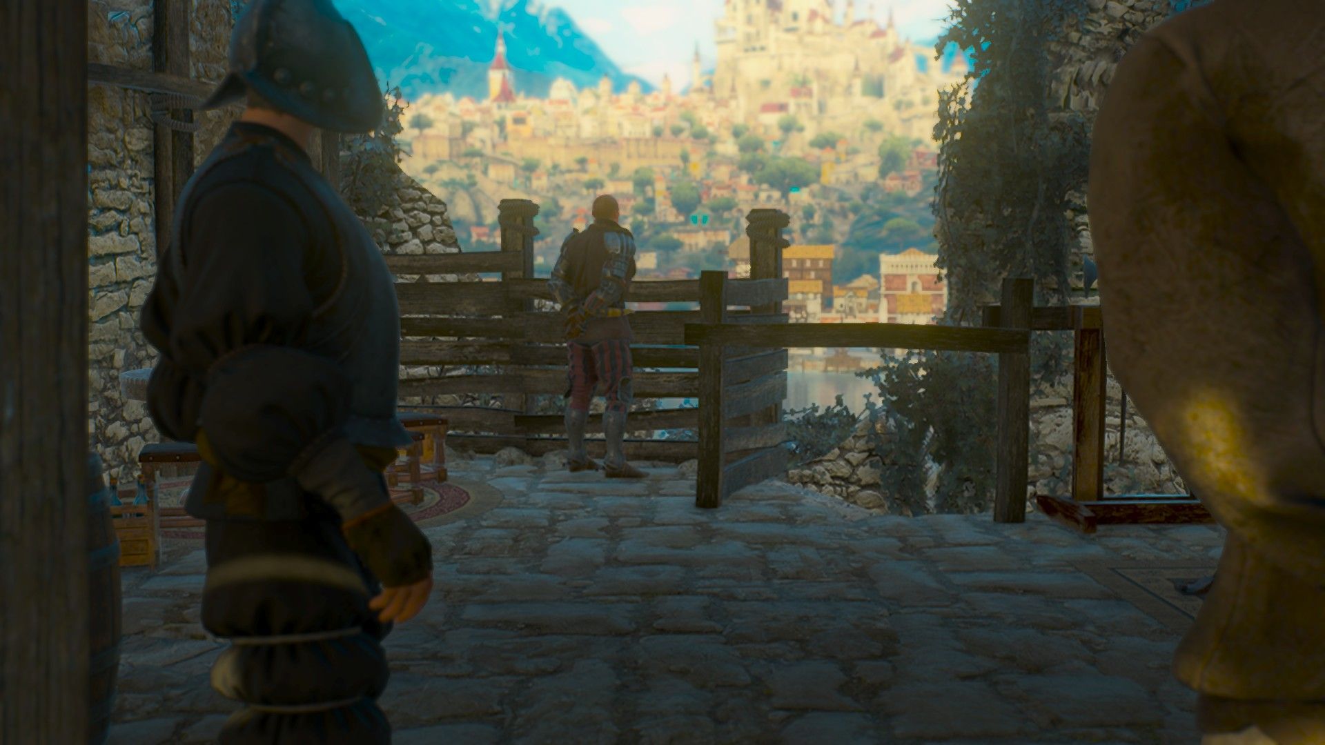 Damen stands in a tower, with his arms behind his back, as he waits for Geralt to be brought to him.