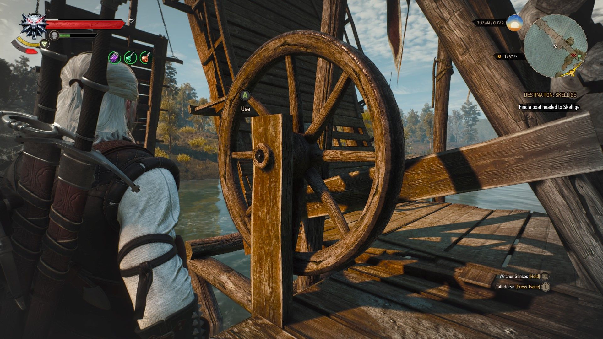 A screenshot of Geralt looking at a mechanism needed to lower a bridge across a river.