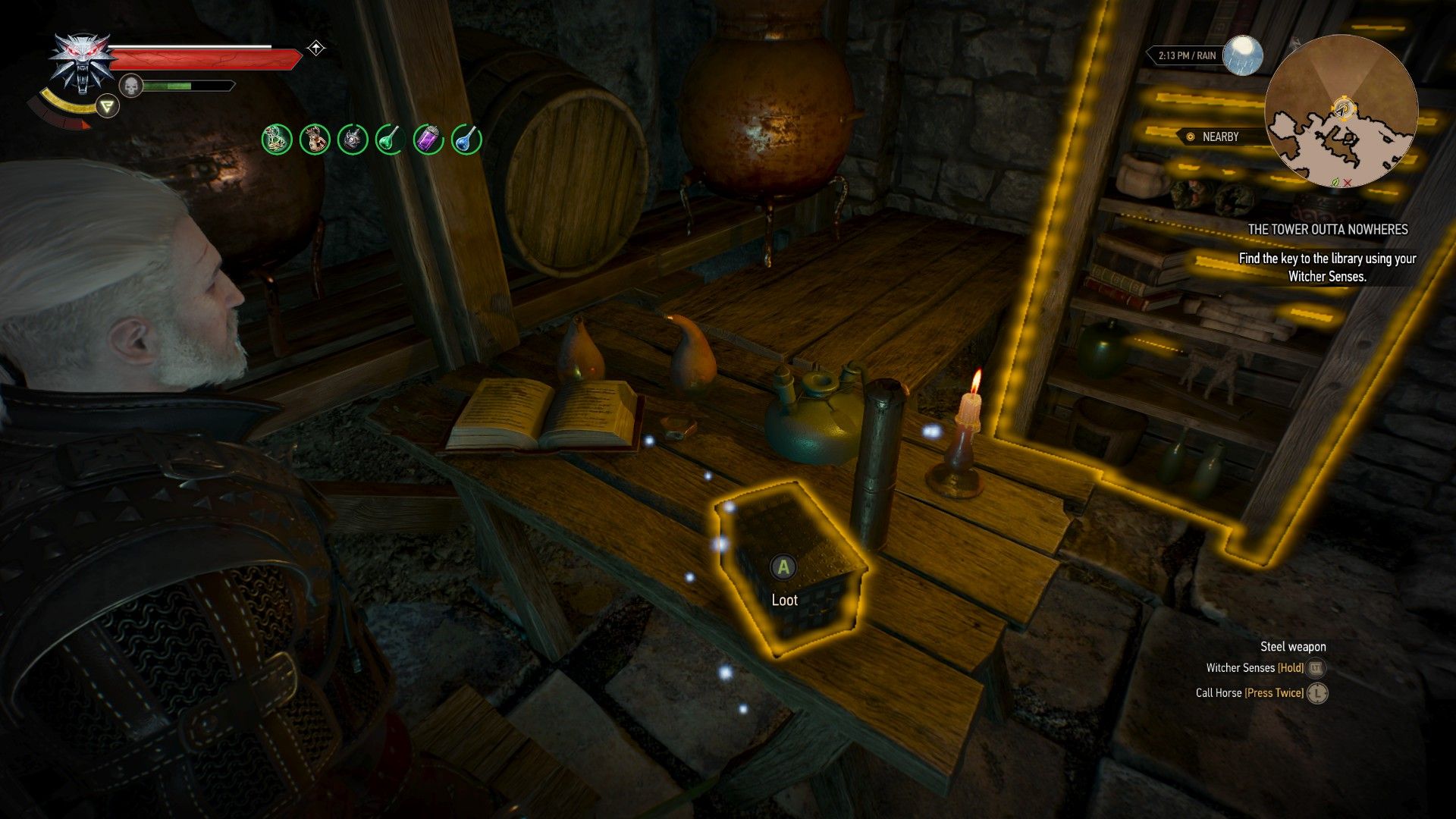 A screenshot of Geralt standing next to a lockbox on a desk in a cave.