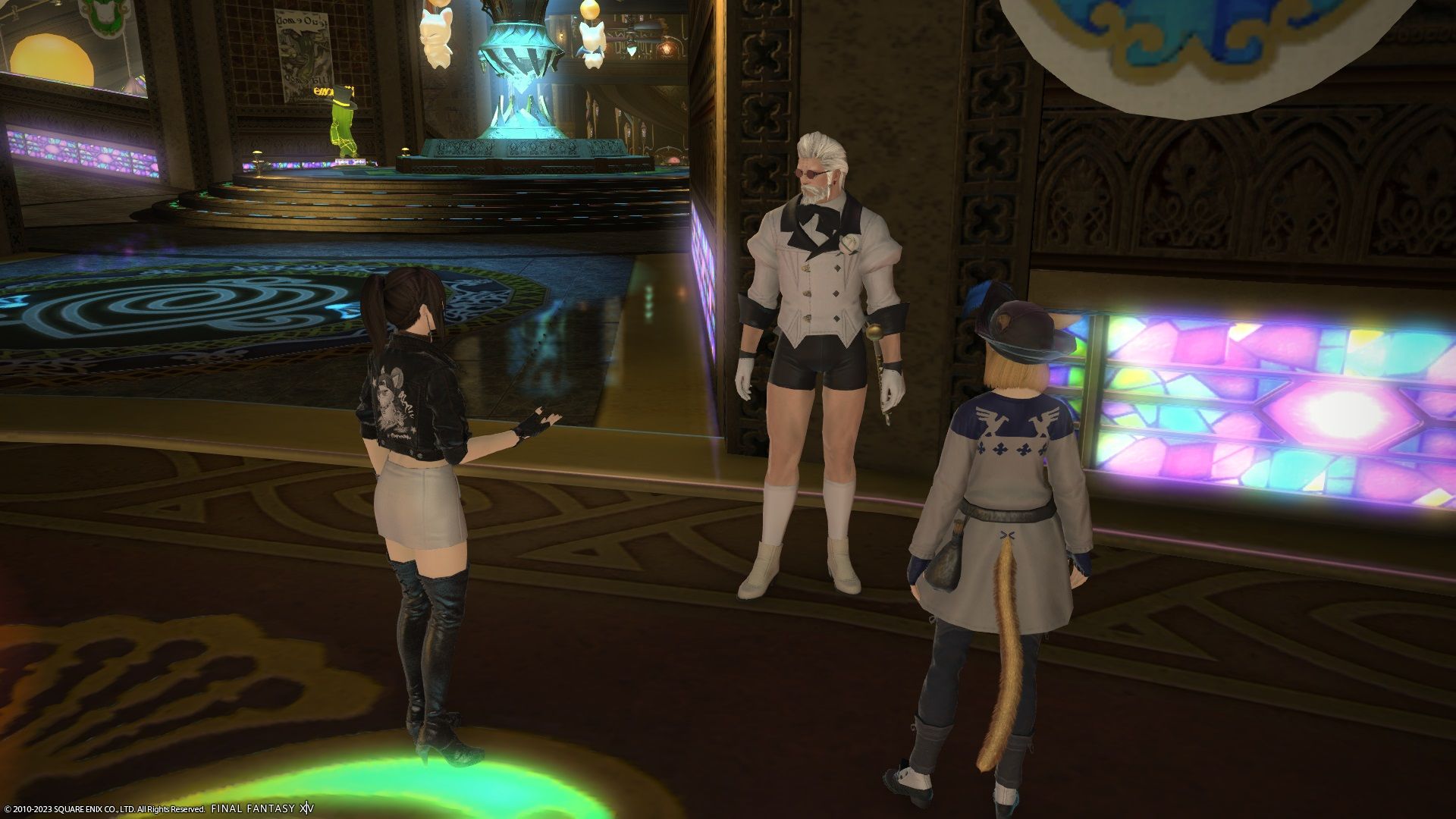 A player and Kipih Jakkya talking to Godbert in Final Fantasy 15.