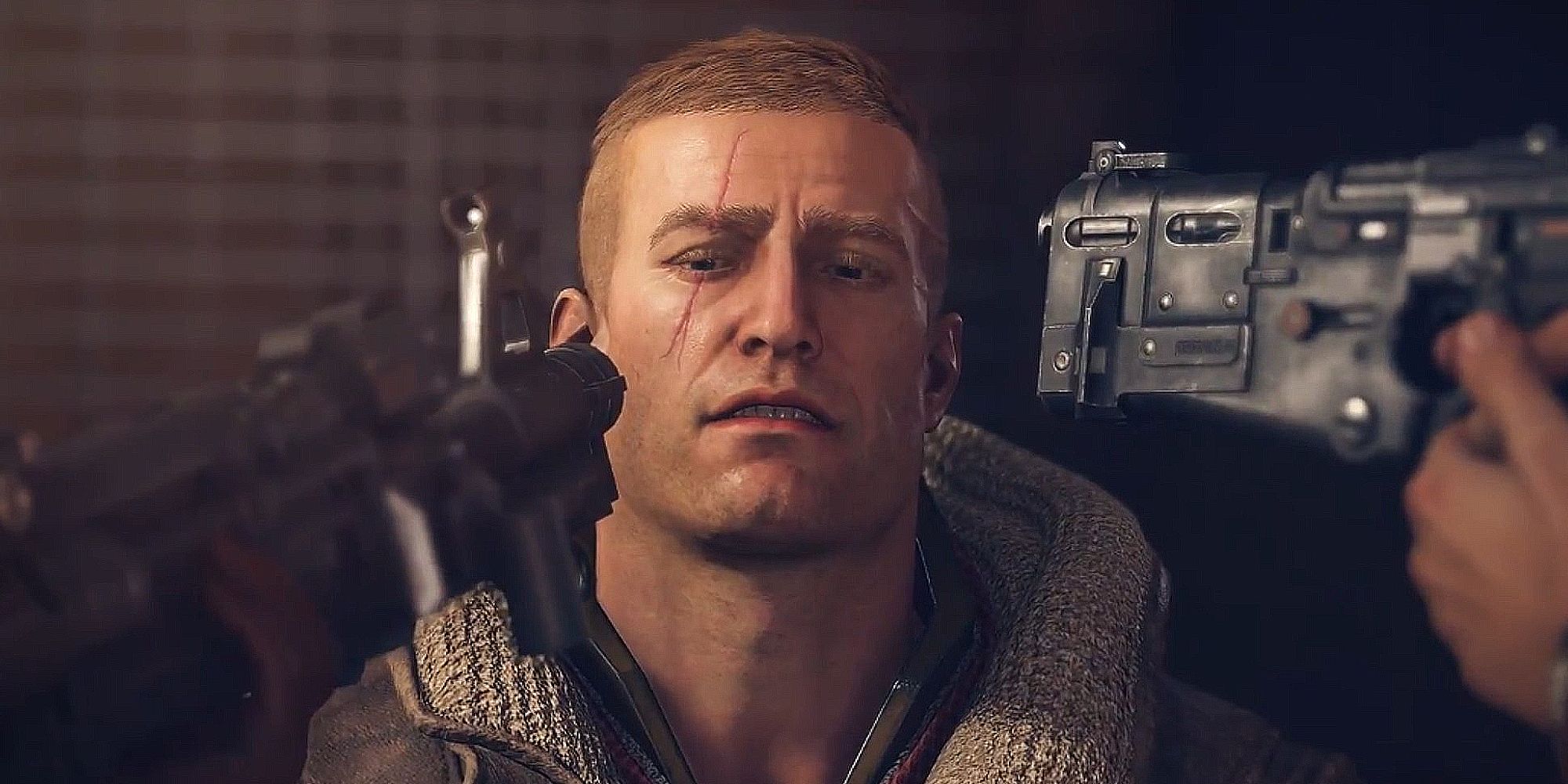 BJ Blazkowicz sits as two guns are pointed towards his head