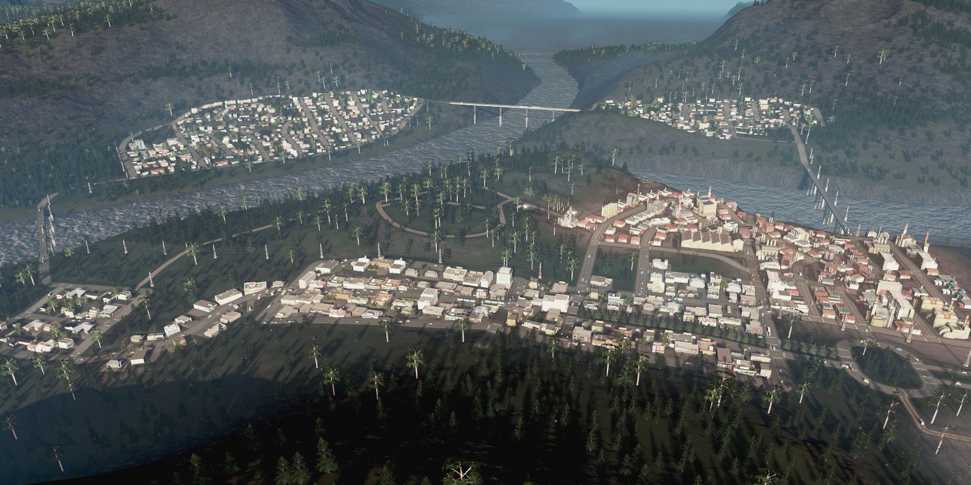 An image of three small towns from the Alpine Village scenario in Cities: Skylines.  These three cities are located on top of mountains and are connected by public transport.
