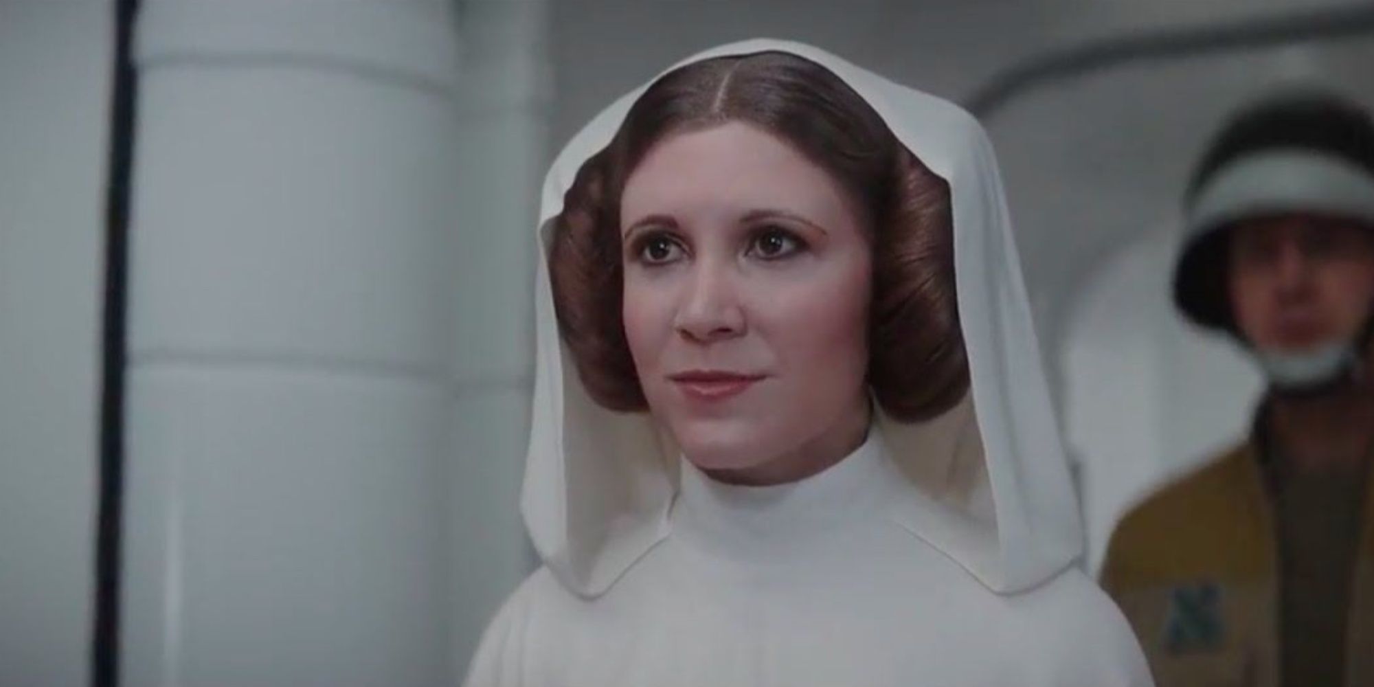 Princess Leia at the beginning of A New Hope confronting Darth Vader as a Rebel officer stands behind her.