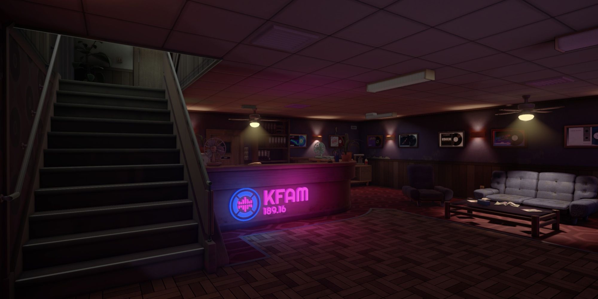 The entrance area of the main location in Killer Frequency, the lobby of the KFAM station with the title on the reception area and The Shining carpet in the distance.